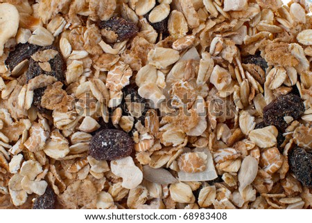 Bran and raisin cereals background, food texture.