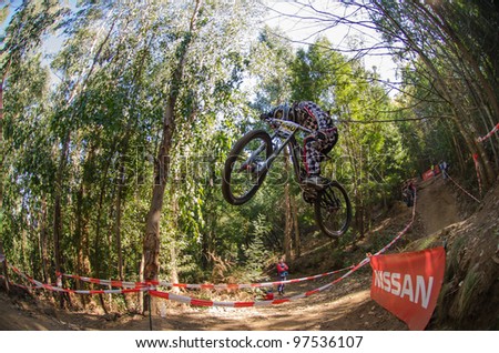 LOUSA, PORTUGAL - MARCH 11: Antonio Rodrigues competes during the 2nd Stage of the Taca de Portugal Downhill Vodafone on March 11, 2012 in Lousa, Portugal.