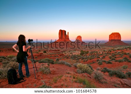 monument valley with nice sunset, being photographed, focus on rocks