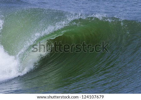 pipeline of a wave hitting near the beach