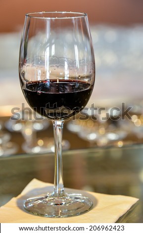 nice glass of red wine on bar top