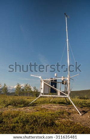 weather station at wonder lake ranger station in denali national park, with mt. denali visible in background