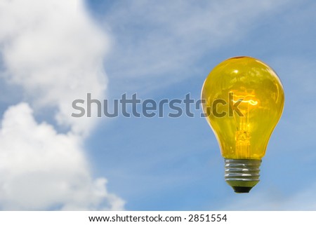 Tem uma luz muito estranha brilhando agora no ceu... Stock-photo-glowing-clear-yellow-light-bulb-as-caution-against-blue-sky-with-puffy-clouds-2851554