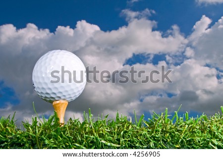 stock photo : golf ball on tee golf ball on tee. stock photo : golf ball on tee