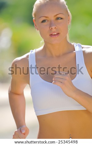 lovely blond female jogging