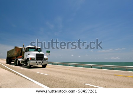 hauler truck crossing seven mile bridge in florida keys