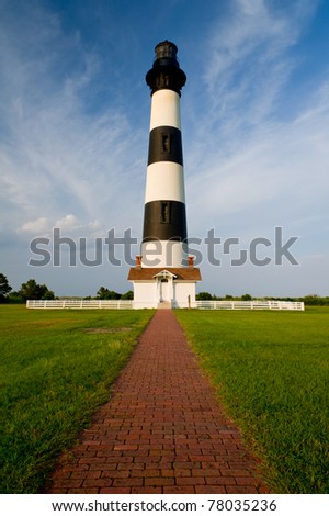 historic bodie island lighthouse in outer banks of north carolina, with light being renovated