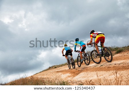 ALMATY, KAZAKHSTAN - APRIL 30: Unidentified bikers in action at Adventure mountain bike cross-country marathon in mountains \