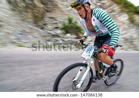 ALMATY, KAZAKHSTAN - JULY 14: M.Sotnikov (No. 73) in action at  the sports event Up Hill \