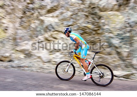 ALMATY, KAZAKHSTAN - JULY 14: Y.Shkerdin (No. 49) in action at  the sports event Up Hill \