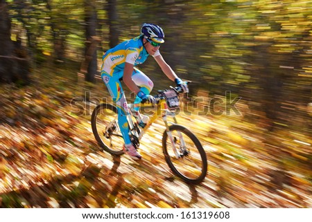 ALMATY REGION, KAZAKHSTAN - OCTOBER 13: Y.Shkerdin (N193) in action at  mountain bike sports event 