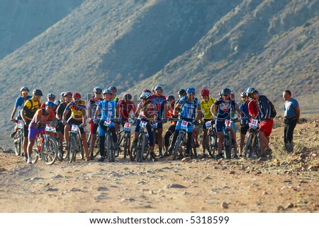 Bike race start in desert mountains