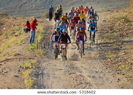 Bike race start in desert mountains