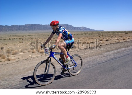 ALMATY, KAZAKHSTAN - May 2: Artem Buyanauskas in action at Adventure mountain bike cross-country marathon in desert \