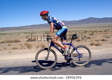 ALMATY, KAZAKHSTAN - May 2: Artem Buyanauskas in action at Adventure mountain bike cross-country marathon in desert \
