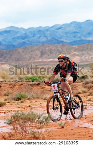 ALMATY, KAZAKHSTAN - May 1: Vasily Kochetkov  in action at Adventure mountain bike cross-country marathon in desert 