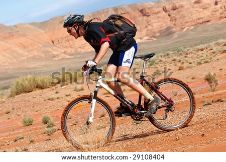 ALMATY, KAZAKHSTAN - May 1: Alexey Zatonskih  in action at Adventure mountain bike cross-country marathon in desert \