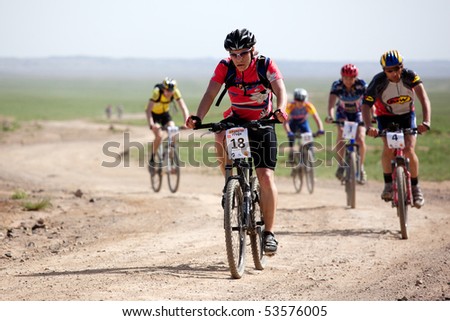 ALMATY, KAZAKHSTAN - MAY 2: A.Monastyrsky (N18)  in action at Adventure mountain bike marathon in desert \