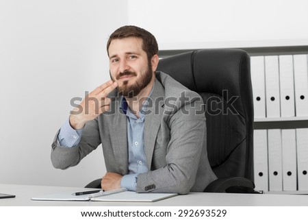 happy man businessman at his desk