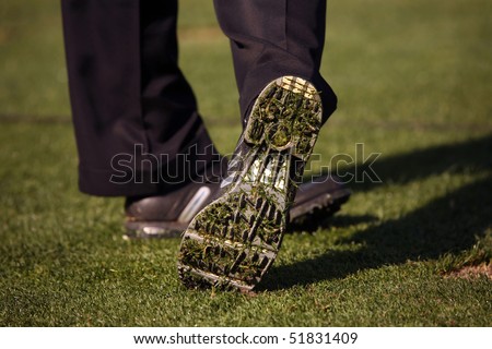 Sole of shoe after golfer hits ball