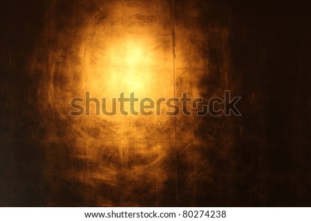 Hi-res golden wall background with reflection