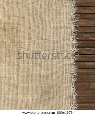 Old fabric in wooden wall