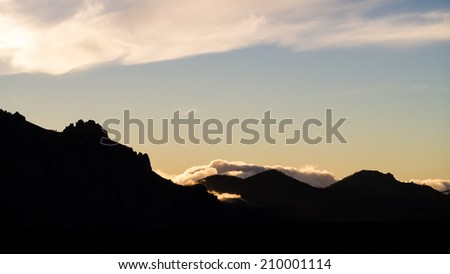 clouds at dusk in the mountains of Las Canadas National Park at the Island of Tenerife