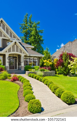 nice entrance of a luxury house over outdoor landscape - stock photo