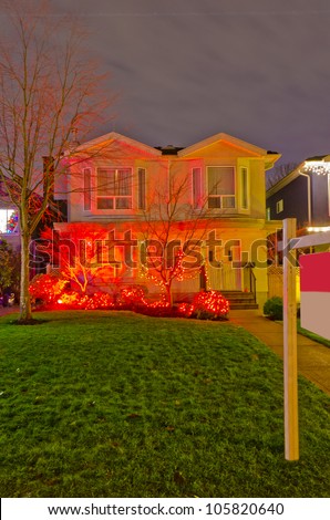 House Decorated and Lighted for Christmas at Night at Vancouver, Canada.