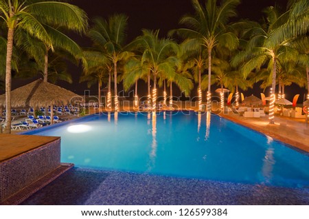 luxury resort with pool at night view