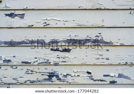 the background of an old light blue painted wood