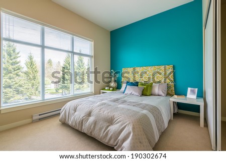 Modern blue bedroom interior in a luxury house