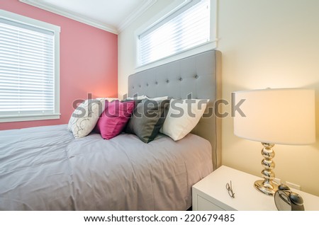 Modern red bedroom interior in a luxury house