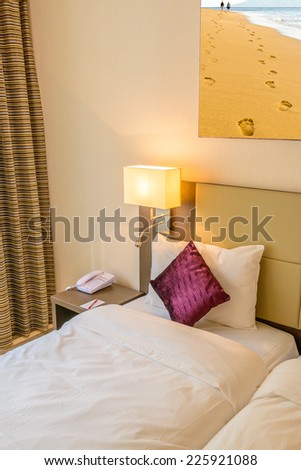 Modern brown yellow bedroom interior in a luxury house hotel resort