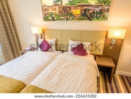 Modern brown yellow bedroom interior in a luxury house hotel resort