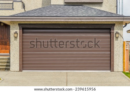 Luxury house with double garage door in Vancouver, Canada.