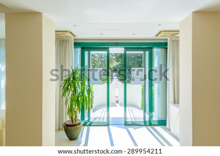 Entrance of a large luxury dining room interior. New empty hotel or home space.