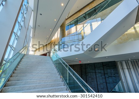 Abstract fragment of the architecture of modern lobby, hallway of the luxury hotel, shopping mall, business center in Vancouver, Canada. Interior design.