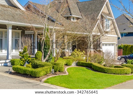 A perfect neighborhood. Houses in suburb at Spring in the north America.
