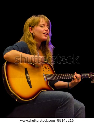 VANCOUVER, CANADA - OCTOBER 27: Sandra Bouza on the stage of The Waves Coffee House on October 27, 2011 in Vancouver, Canada.