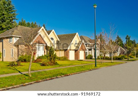 A perfect neighborhood. Houses in suburb at Fall in the north America