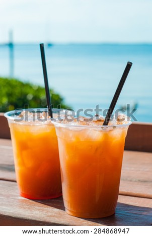 Red Fruity Drinks by the Sea