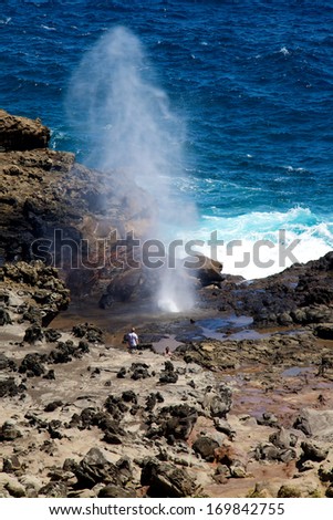Nakalele Blowhole in Maui Hawaii, produces powerful geyser-like water spouts with the waves and tides. Water spewed from the blowhole can rise as high as 100 feet in the air.