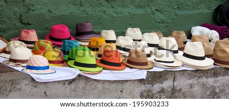 Panama hats set out for sale at an open air market in Bogota Colombia.