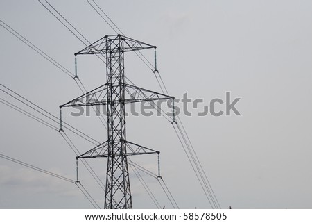 A large hydro tower with power lines set on left side of frame