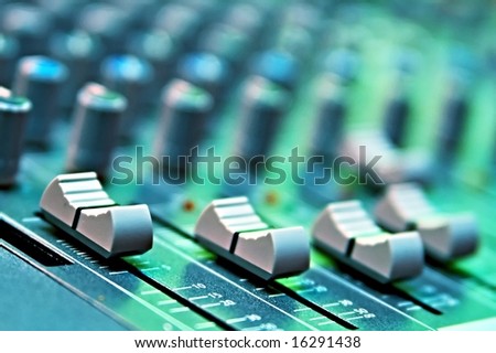 buttons equipment in audio recording studio of the green colour buttons equipment in audio recording studio of the green colour