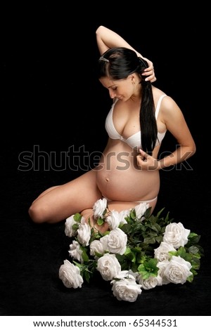 pregnant with roses on black
