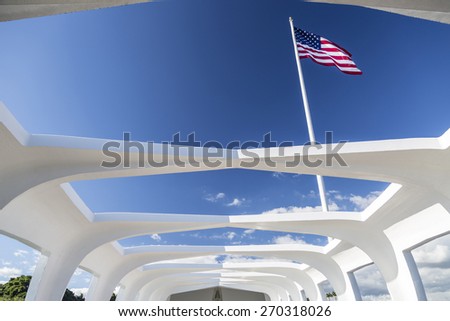 Pearl Harbor, Hawaii - January 11, 2015: The American flag seen from inside the USS Arizona Memorial in Pearl Harbor, Hawaii.