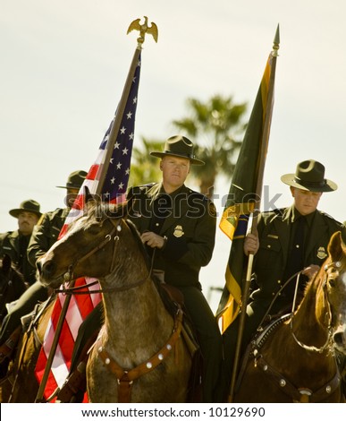 Mounted U.S. Border Patrol Officers in the Parada Del Sol (called world\'s largest horse drawn parade) held in February in Scottsdale Arizona.
