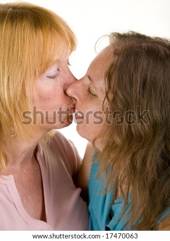 stock photo Attractive mature lesbian couple kissing isolated on white